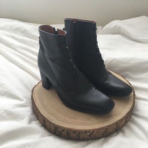 Black leather heeled boots